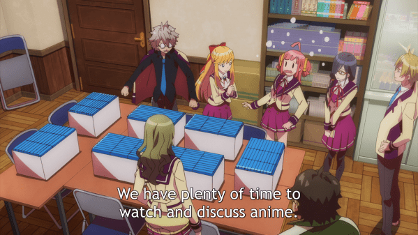 Four girls and two boys in school uniforms stand around a table covered in boxes filled with what look like blu-ray cases. A pink-haired girl looks startled, while the other seem happy. Subtitle: "We have plenty of time to watch and discuss anime."