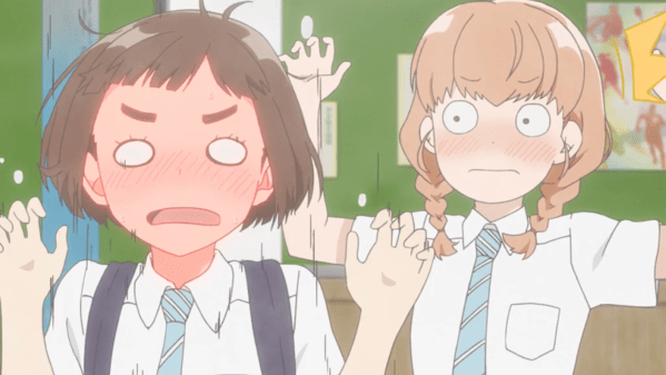 Two teen girls with their arms raised, flushing and looking frazzled