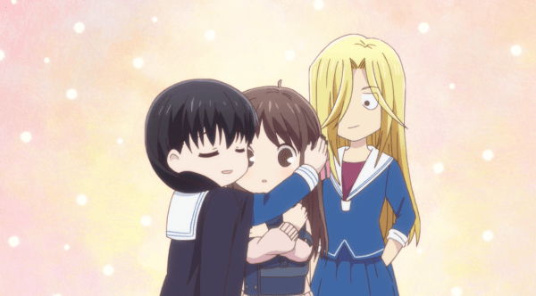 Hana hugs Tohru while Uotani watches Tohru proudly